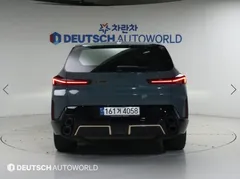2023 BMW XM 4.4, зелёный — фото 4