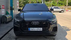 2023 Audi Q8 55 TFSI Quattro Premium, серый — фото 1