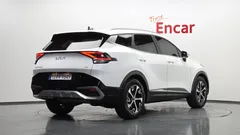 2023 Kia Sportage Signature 2WD, белый — фото 2