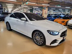 2021 Mercedes-Benz E-Class E350 4MATIC AMG Line, белый — фото 1