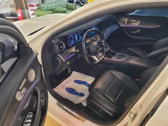 2021 Mercedes-Benz E-Class E350 4MATIC AMG Line, белый — фото 10