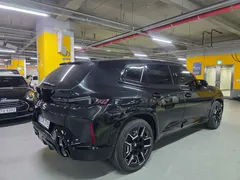 2023 BMW XM 4.4, чёрный — фото 4