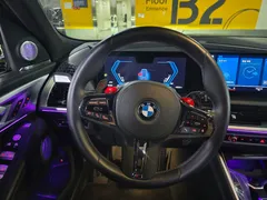 2023 BMW XM 4.4, чёрный — фото 8