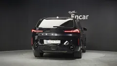 2023 BMW XM 4.4, чёрный — фото 4