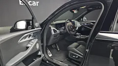 2023 BMW XM 4.4, чёрный — фото 10