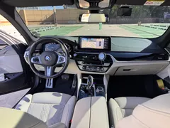 2022 BMW 5-Series M550i xDrive — фото 9