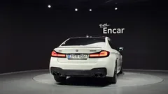 2023 BMW 5-Series M550i xDrive — фото 4