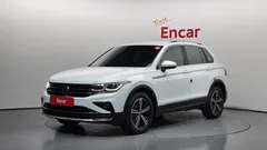 2022 Volkswagen Tiguan 2.0 TDI 4-Motion Premium, белый — фото 1
