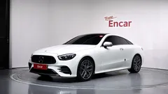 2023 Mercedes-Benz E-Class E300d 4MATIC Coupe, белый — фото 1
