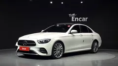 2022 Mercedes-Benz E-Class E350 4MATIC AMG Line, белый — фото 1