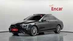 2022 Mercedes-Benz E-Class E350 4MATIC AMG Line, серый — фото 1