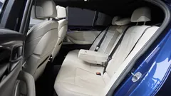 2022 BMW 5-Series M550i xDrive, синий — фото 11