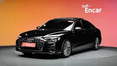 2023 Audi A8 55 TFSI Quattro Premium LWB, чёрный — фото 1