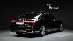 2023 Audi A8 55 TFSI Quattro Premium LWB, чёрный — фото 2
