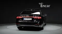 2023 Audi A8 55 TFSI Quattro Premium LWB, чёрный — фото 4