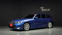2023 BMW 3-Series 320d Touring M Sport, синий — фото 1