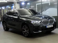 2022 BMW X6 xDrive40i M Sport, серо-серебристый — фото 1