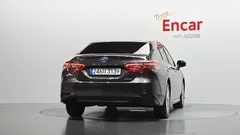 2023 Toyota Camry 2.5 LE Hybrid, коричневый — фото 4