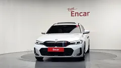 2024 BMW 3-Series 320i Touring M Sports, белый — фото 3