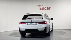 2024 BMW 3-Series 320i Touring M Sports, белый — фото 4