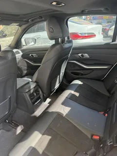 2022 BMW 3-Series 320i M Sport, белый — фото 15