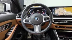 2023 BMW 3-Series 320i M Sport, серо-серебристый — фото 13