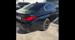 2023 BMW 5-Series 530e M Sport, чёрный — фото 7