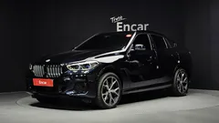 2022 BMW X6 xDrive40i M Sport, чёрный — фото 12