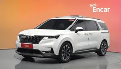 2023 Kia Carnival Gasoline 7-Seater Signature, белый — фото 1