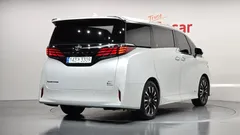 2024 Toyota Alphard 2.5 HEV Executive AWD, белый — фото 2