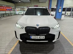 2024 BMW X5 xDrive 50e First Editon, белый — фото 12