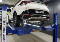 2023 Kia Sportage Signature 2WD, белый — фото 2