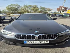 2023 BMW 5-Series 520i Luxury, чёрный — фото 1