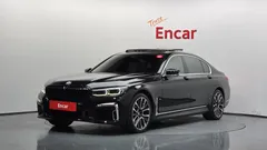 2022 BMW 7-Series 740Li xDrive M Sport Package, чёрный — фото 1