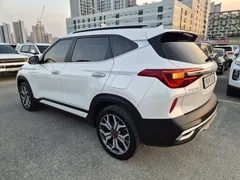2023 Kia Seltos Gasoline 1.6 Turbo 2WD, белый — фото 6