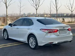 2023 Toyota Camry 2.0G Luxury, белый — фото 9