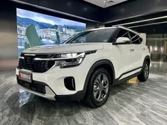 2023 Kia Seltos 1.5L IVT Luxury, белый — фото 1