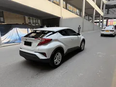 2023 Toyota C-HR 2.0L, белый — фото 6