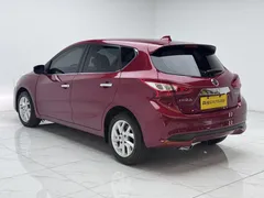 2023 Nissan Tiida 1.6L CVT, красный — фото 5