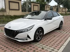 2022 Hyundai Elantra 1.5L CVT LUX Premium, белый — фото 1