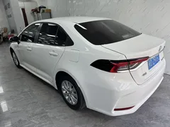 2021 Toyota Corolla 1.5L CVT Elite, белый — фото 6