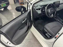 2021 Toyota Corolla 1.5L CVT Elite, белый — фото 7