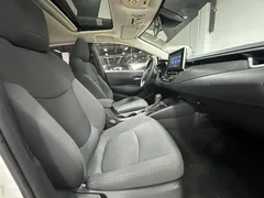 2021 Toyota Corolla 1.5L CVT Elite, белый — фото 6