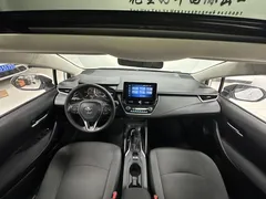 2021 Toyota Corolla 1.5L CVT Elite, белый — фото 13