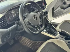 2021 Volkswagen Polo Plus 1.5L AT Colorful Tech, белый — фото 7