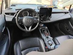 2021 Toyota Corolla 1.5L CVT Elite, белый — фото 5