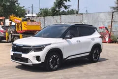 2023 Kia Seltos 1.5L IVT Premium, белый — фото 1