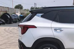 2023 Kia Seltos 1.5L IVT Premium, белый — фото 7