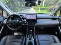 2023 Toyota Corolla Cross 2.0L CVT Elite, белый — фото 11
