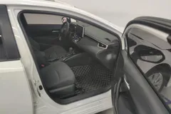 2021 Toyota Corolla 1.5L CVT Elite, белый — фото 6